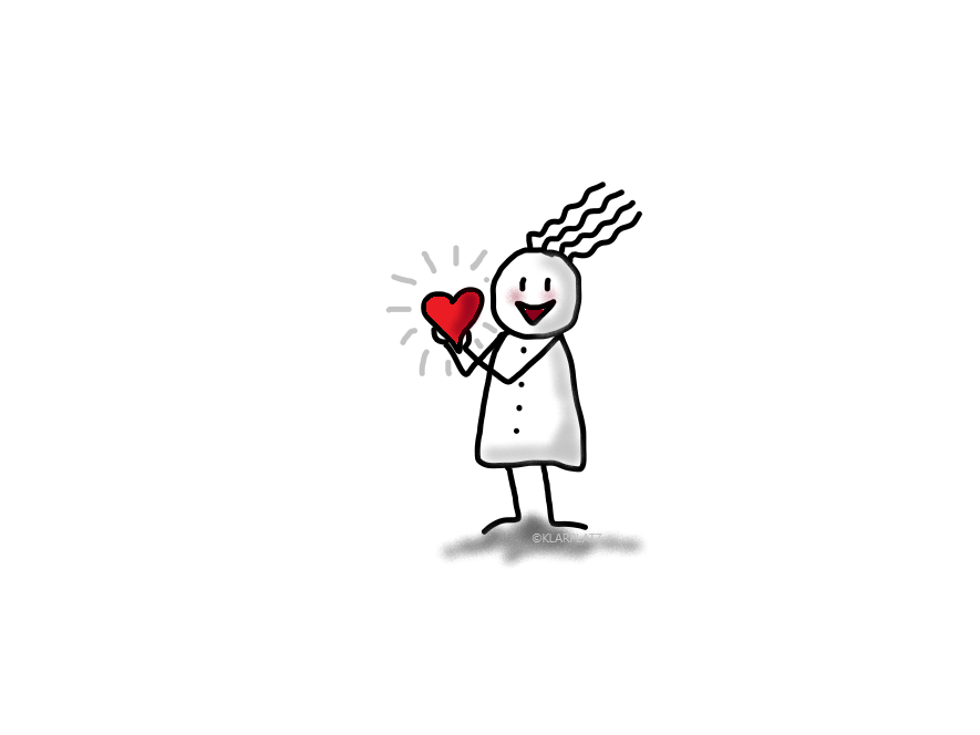 Vierhaar-Figur hält ein rotes Herz in der Hand – Symbol für Selbstfürsorge und bewusste Reflexion zum Jahresbeginn.
